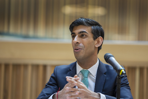 Rishi Sunak participates in a meeting after being inaugurated.