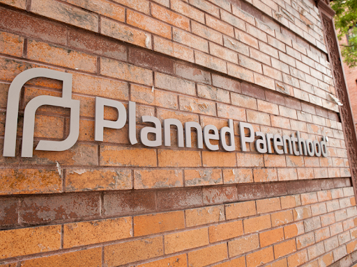 Planned Parenthood logo on the side of a wall