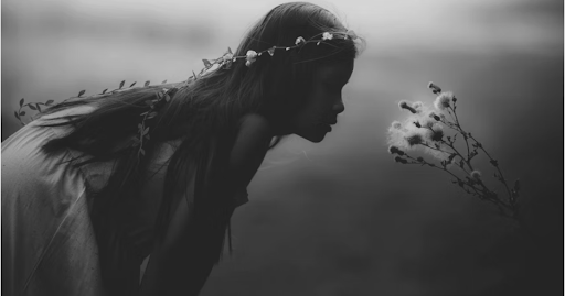 Young Girl Blowing Flower. Sarah Mak. Unsplash.com. December 28, 2015. Free to use